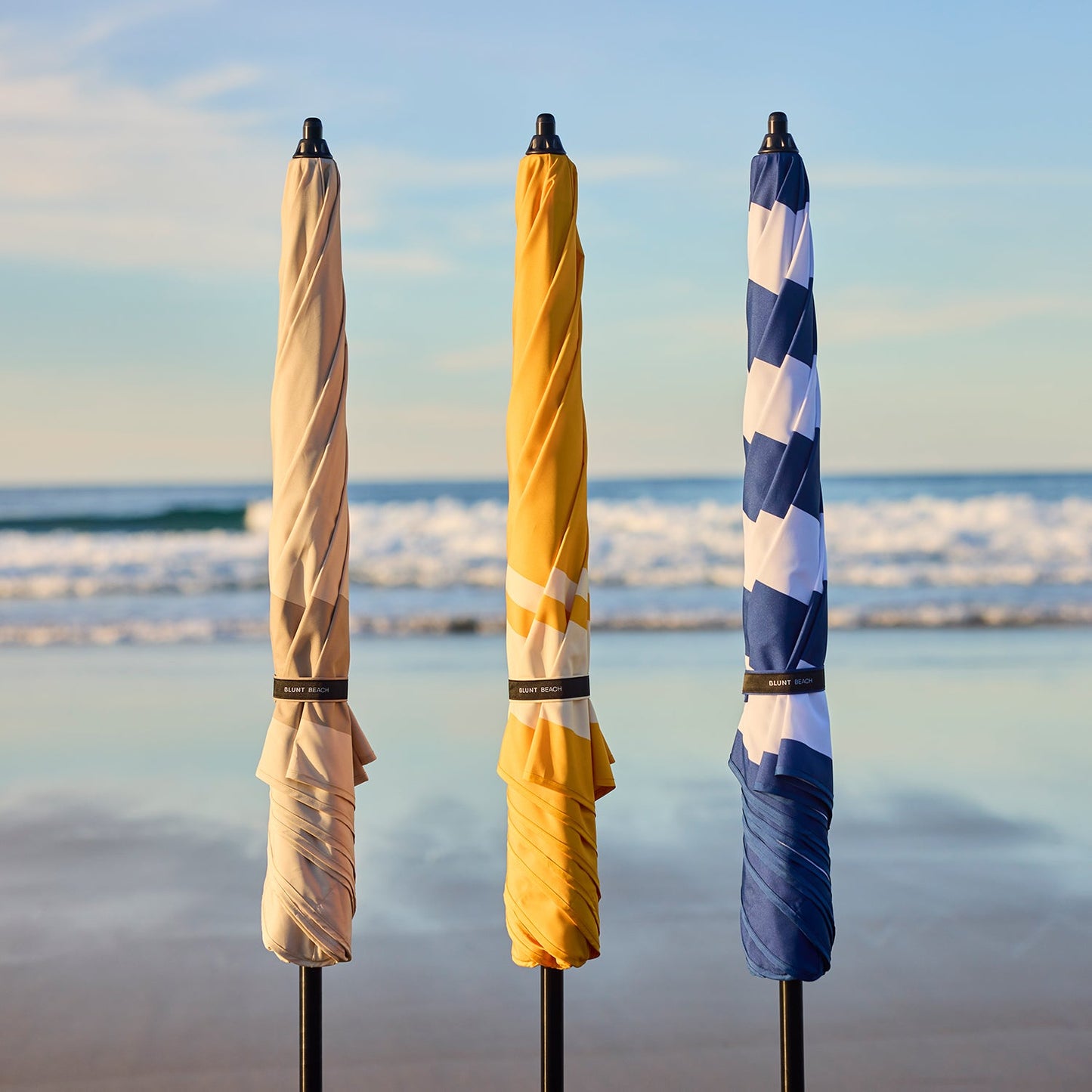 blunt | beach umbrella | sea