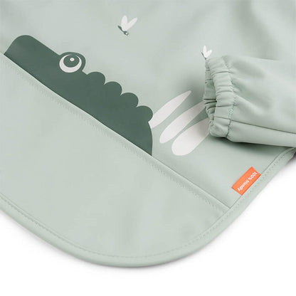 Done by Deer Sleeved Pocket Bib - Green - Croco
