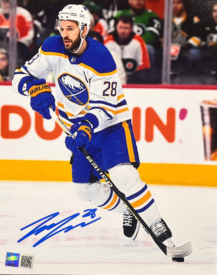 Zemgus Girgensons Signed Skating In White 8x10 Photo (Vertical) CLEARANCE TSE Buffalo